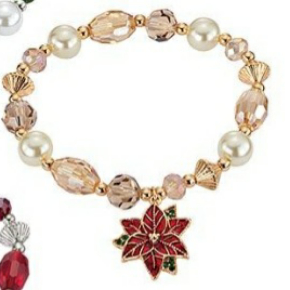 New in box Avon Studio 1886 Festive Stretch Bracelet with Poinsettia Charm